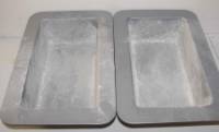 our into two lightly greased and floured 9x5" loaf pans. 